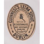 Beer label, Guinness's Extra Stout, a rare c1896 vertical oval label bottled by R Southwood, Dawlish