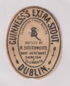 Beer label, Guinness's Extra Stout, a rare c1896 vertical oval label bottled by R Southwood, Dawlish