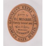 Beer label, Guinness's Extra Stout, bottled by R C Musgrave, Teignmouth, rare c1896 vertical oval,