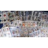 Cigarette & trade cards, a collection of cards in sleeves, representing approx. 60 different series,