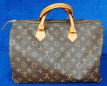 Louis Vuitton Speedy Cloth handbag, complete with padlock and 2 keys (used vg)