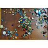 A collection of Victorian and later glass marbles.