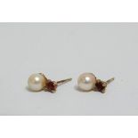 A pair of 9ct gold pearl stud earrings.