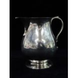 A Georgian style silver milk jug of baluster form, London 1939, maker Wakely & Wheeler, weight 9.2oz