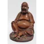 An early 20th century Chinese hardwood carved figure of Hotei, height 17cm.