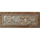 An early 20th century Chinese silk embroidered panel decorated with a bird on a flowering bough,
