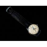 A mid 1950s Omega gentlemans stainless steel wristwatch with Arabic and faceted dagger numerals,