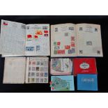 Three albums of British and world stamps, together with a tin of loose stamps.