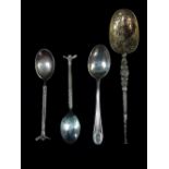 An Edwardian silver gilt copy of 'The Anointing Spoon', Birmingham 1910, together with a pair of