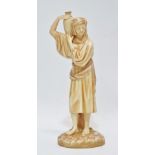 An early 20th century Royal Worcester porcelain figure of a middle eastern water carrier, height