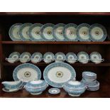 A Wedgwood 'Florentine' pattern part dinner service, comprising two tureens, eight dinner plates,