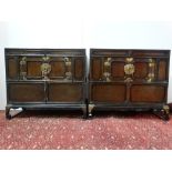 A pair of early 20th century Korean pine and elm cabinets on stands, each fitted a cupboard with