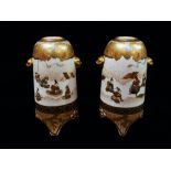 A good pair of Japanese Meiji period Satsuma cylindrical miniature vases, the body with twin lion