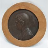 A bronze circular plaque of Edward VIII, within later frame, diameter 33cm.