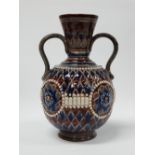 A Royal Doulton stoneware twin handled vase, with applied decoration, impressed maker's mark to