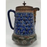 A Doulton Lambeth large stoneware jug, the body decorated with floral bosses, with silver plated rim