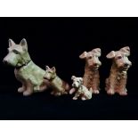 A group of five Sylvac Scottie dog figures, largest height 24cm.