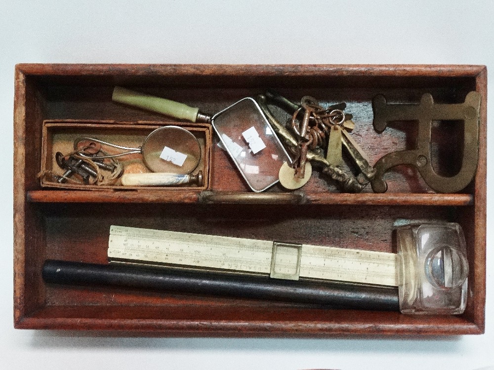 A 19th century mahogany cutlery tray, together with a slide rule, an ebony rolling rule, a small - Image 2 of 3