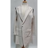 A ladies Trager Delaney cream cotton coat with black velvet ruff detail to the back and sleeves,