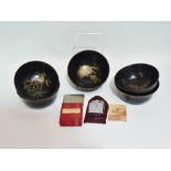 A set of five lacquer bowls, decorated with goldfish, butterflies and bamboo, together with a Ronson