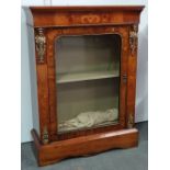 A 19th century walnut and inlaid side cabinet fitted with ormolu mounts and glazed door with