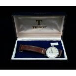 A Tissot gentleman's manual wind wristwatch within steel case and original box, the 28mm white