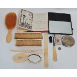 A collection of Victorian ivory backed brushes, together with a leather bound Freemasonary book