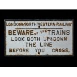 A cast iron London & North Western Railway sign, inscribed 'BEWARE OF THE TRAINS LOOK BOTH UP & DOWN