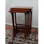 An early 20th century nest of three mahogany occasional tables, height 70cm, width 49cm.