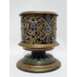A 19th century Doulton stoneware and brass oil lamp base, decorated with scrolling designs and