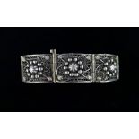 A continental silver filigree six panel bracelet, weight 32g approximately.