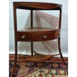 An early 19th century mahogany corner washstand, fitted a single drawer above shaped stretcher,