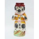 A 19th century Staffordshire Pottery jug in the form of a dog wearing a ruff, coat and hat, height