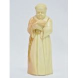 An early 20th century Royal Worcester candle snuffer figure modelled as a monk reading, height 12cm.