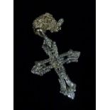 A Roberto Cavalli crucifix on chain.