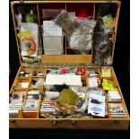 A fly fisher's dressing box, including a large collection of fishing flys and fly making ephemera,