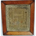A mid 19th century sampler by J. Lewis 1843, with central depiction of Adam and Eve, surrounded by