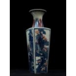 A Chinese porcelain square section tapering vase decorated in underglaze blue and iron red,