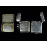 A silver vesta case, Birmingham 1902, together with one other similar and a pill box Birmingham