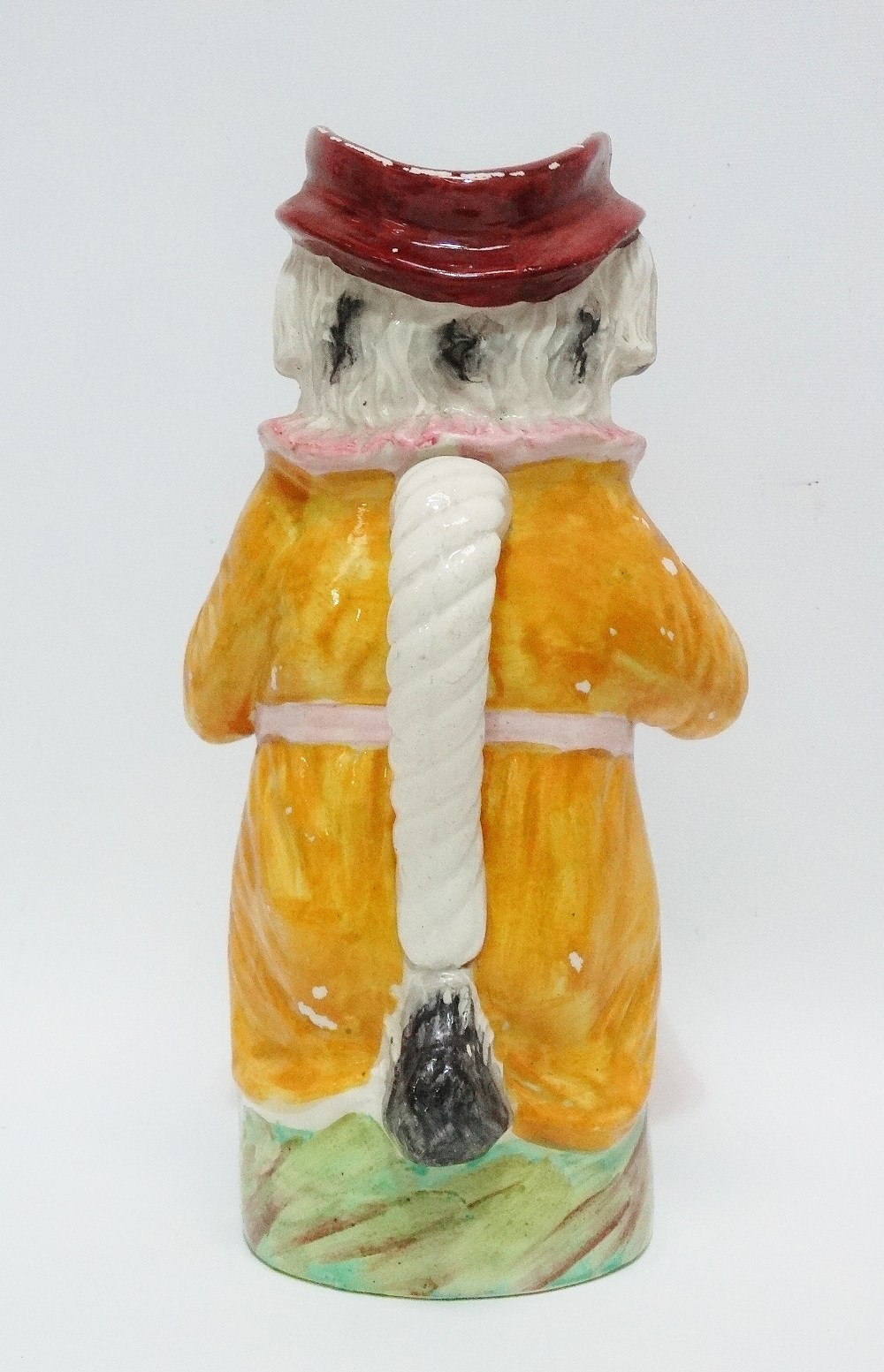 A 19th century Staffordshire Pottery jug in the form of a dog wearing a ruff, coat and hat, height - Image 2 of 2