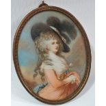 MINIATURE - A late 19th/early 20th century oval miniature on ivory of an aristocratic lady in a