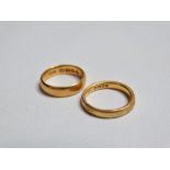 Two 22ct gold wedding bands, weight 9.4g.