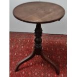 A 19th century mahogany tripod occasional table with turned dished top, diameter 52cm.