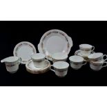 A Minton's 'Rhapsody' pattern tea service, comprising a cake plate, six side plates, six cups and