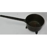 An early 19th century bronze skillet, length 47cm.