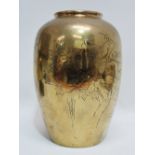 A Japanese polished bronze vase decorated with peacocks amongst flowering foliage, calligraphy