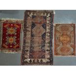 Three Turkish prayer mats, all with various medallions, largest 135 x 75cm.
