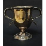 A George III silver twin handled cup of plain form, London 1810, maker's marks I.K. for John King,