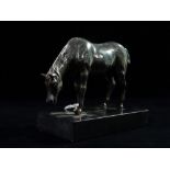 A cast silver horse with finely engraved body, mounted on a slate base, indistinct marks, total