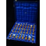 A late 20th century Asprey & Co. London cased chess set, complete with thirty two pieces.
